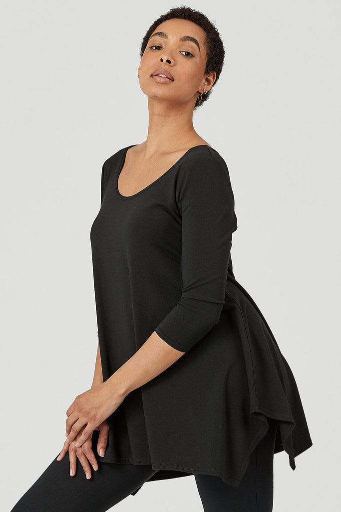 Woman wearing Tencel 3/4 sleeve top in black, Canadian made women's loungewear, side