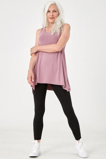 Woman wearing Tencel 3/4 sleeve top in pink, Canadian made women's loungewear, standing