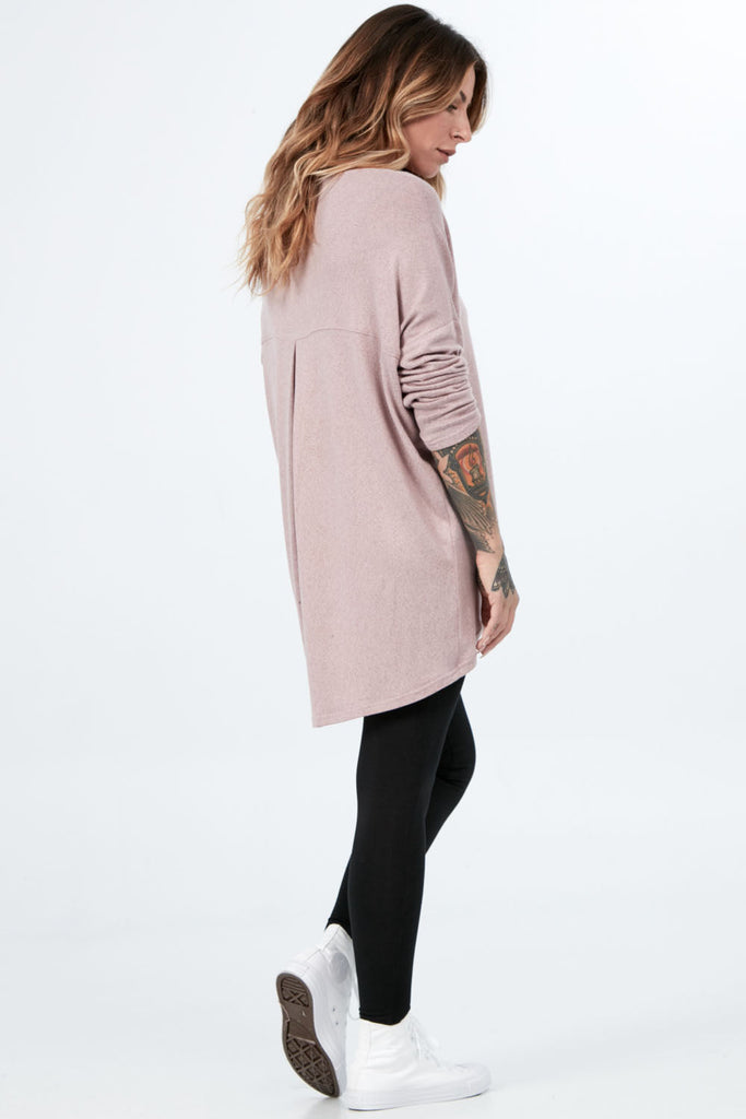 Woman wearing Tencel long sleeve slouchy top in light pink, Canadian made women's loungewear, side