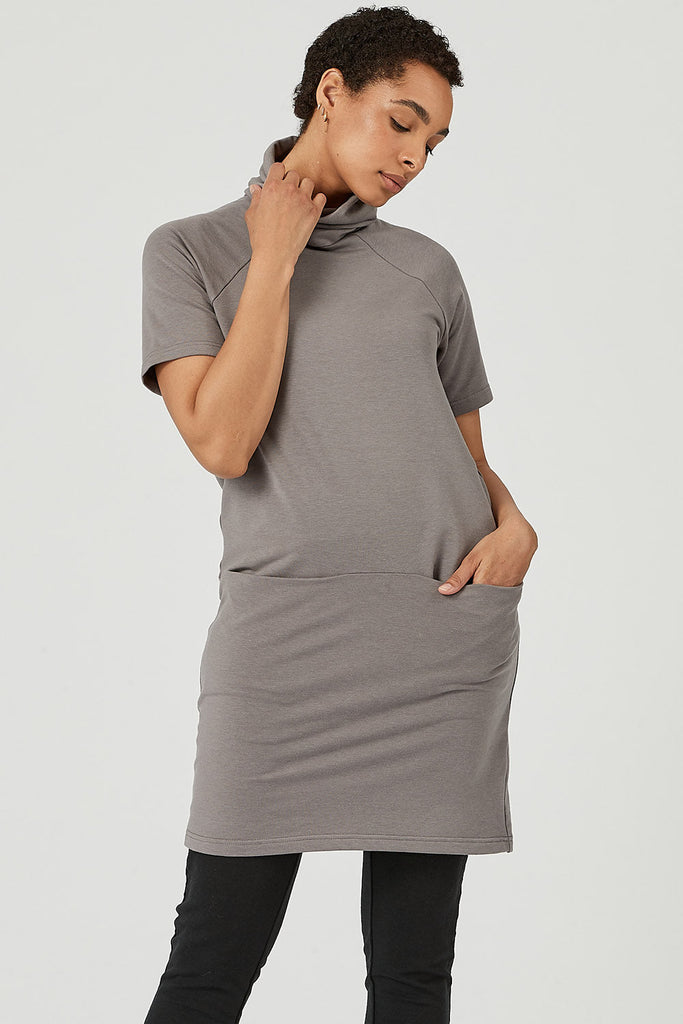 Woman wearing tencel turtleneck tunic with pockets in grey, Canadian made women's loungewear, front
