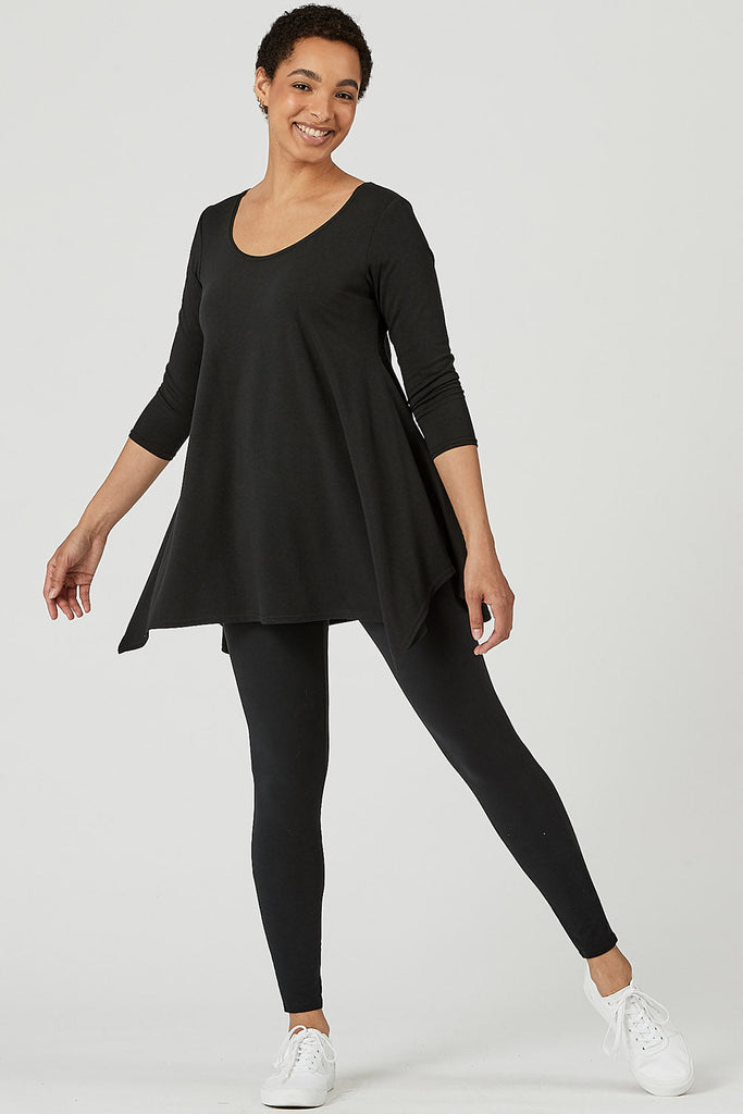 Woman wearing Tencel 3/4 sleeve top in black, Canadian made women's loungewear, standing