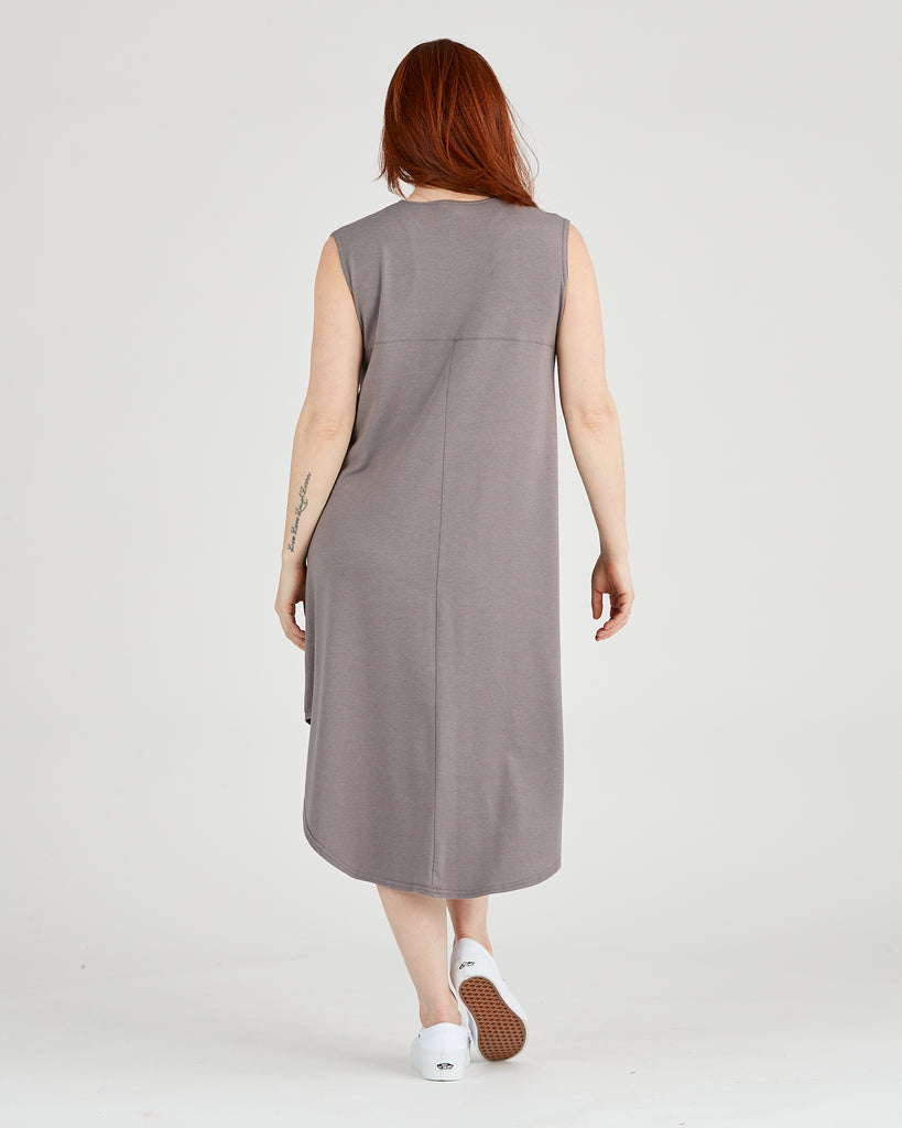 Woman wearing Tencel scooped hem dress in grey, Canadian made women's loungewear, back