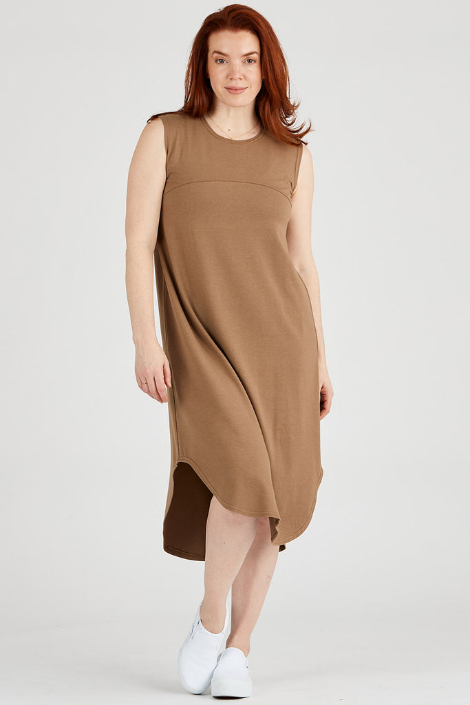 Woman wearing Tencel scooped hem dress in brown, Canadian made women's loungewear, front