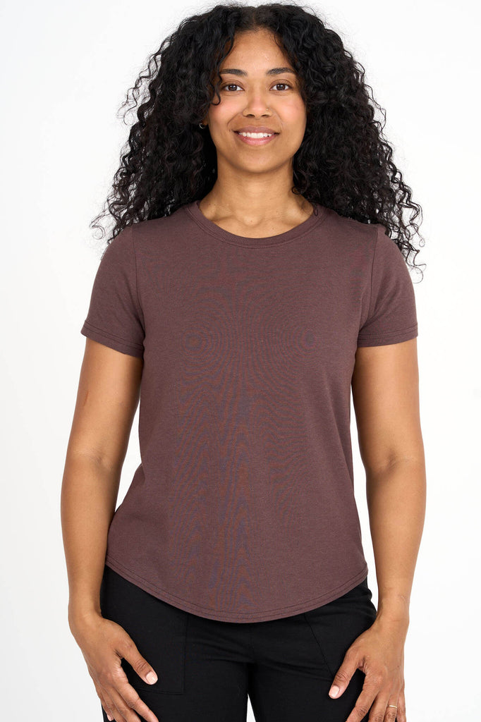 Woman wearing coffee brown Tencel blend classic round neck t-shirt, made by Canadian loungewear label Advika.