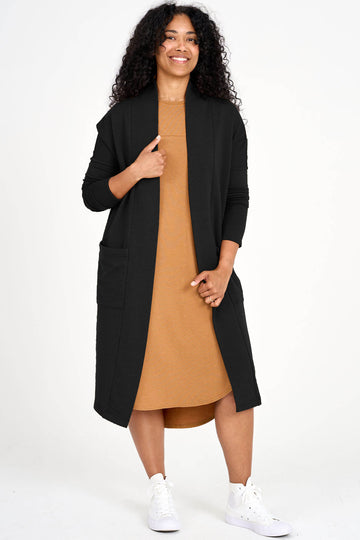 Woman wearing black Tencel long cardigan in grey, Canadian made women's loungewear, front
