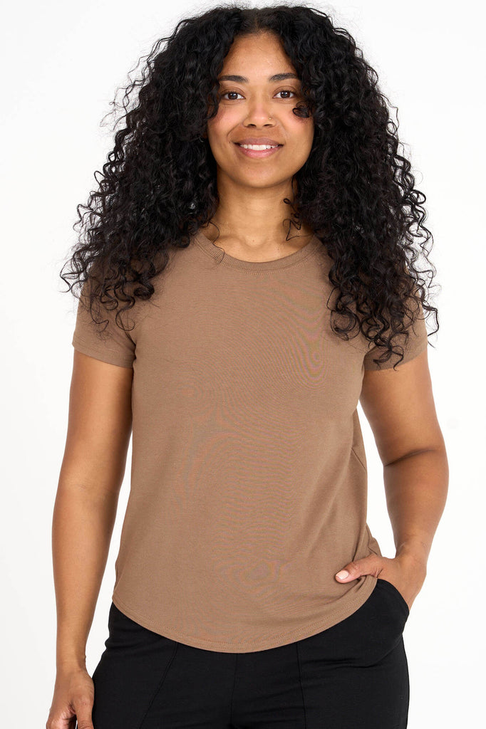 Woman wearing americano brown Tencel blend classic round neck t-shirt, made by Canadian loungewear label Advika.