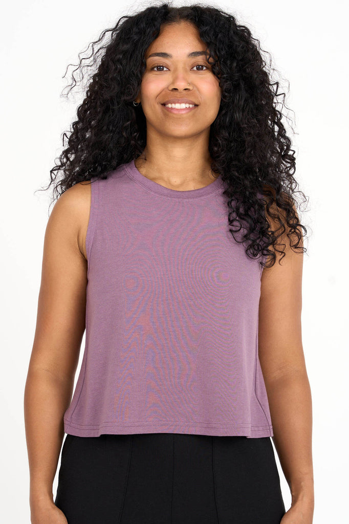 Woman wearing mauve tencel cropped tank top by Canadian loungewear label Advika. 