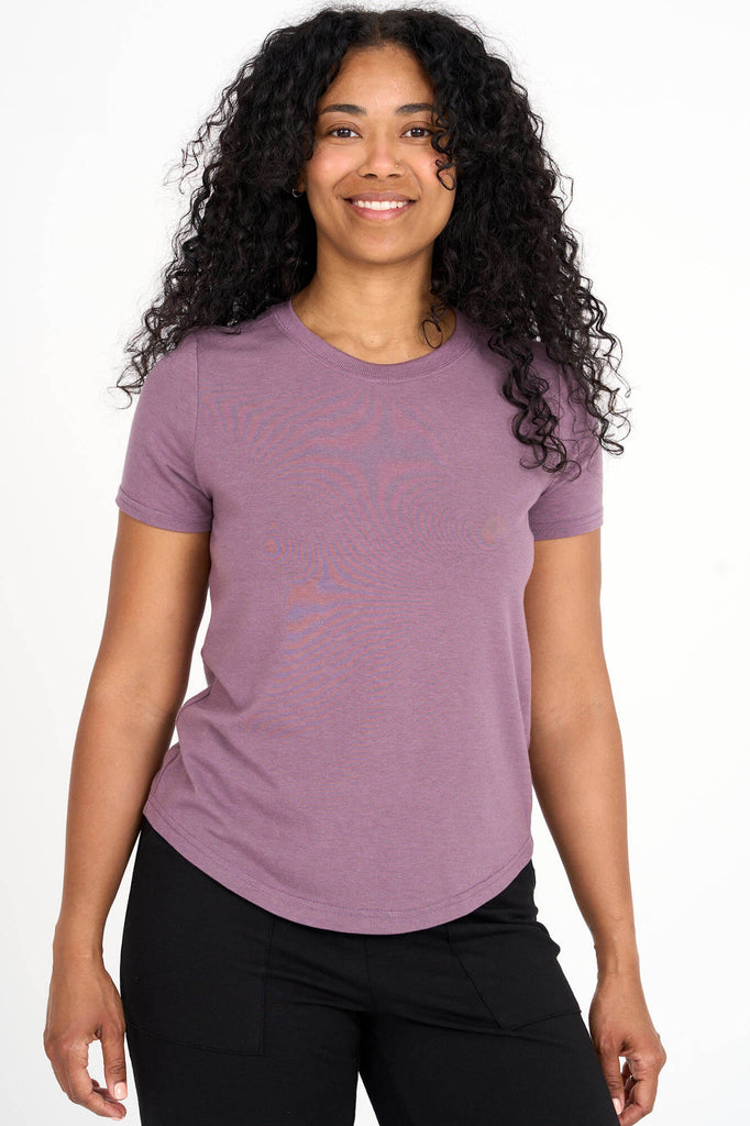 Woman wearing mauve Tencel blend classic round neck t-shirt, made by Canadian loungewear label Advika.