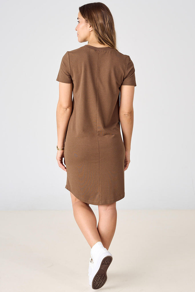 Back view of woman wearing Advika Tencel T-Shirt Dress in Wood Smoke brown. 