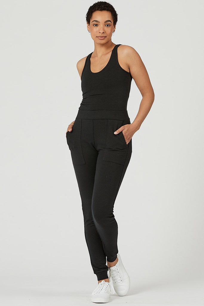 Woman wearing Tencel slim joggers in black, Canadian made women's loungewear, standing