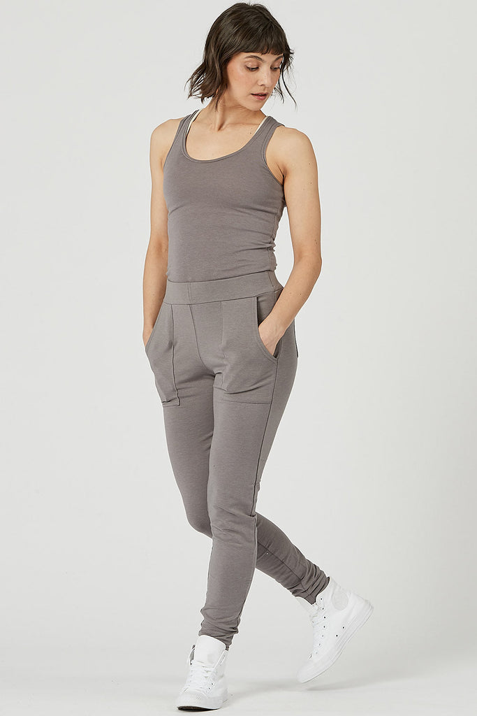 Woman wearing Tencel slim joggers in grey, Canadian made women's loungewear, legs crossed