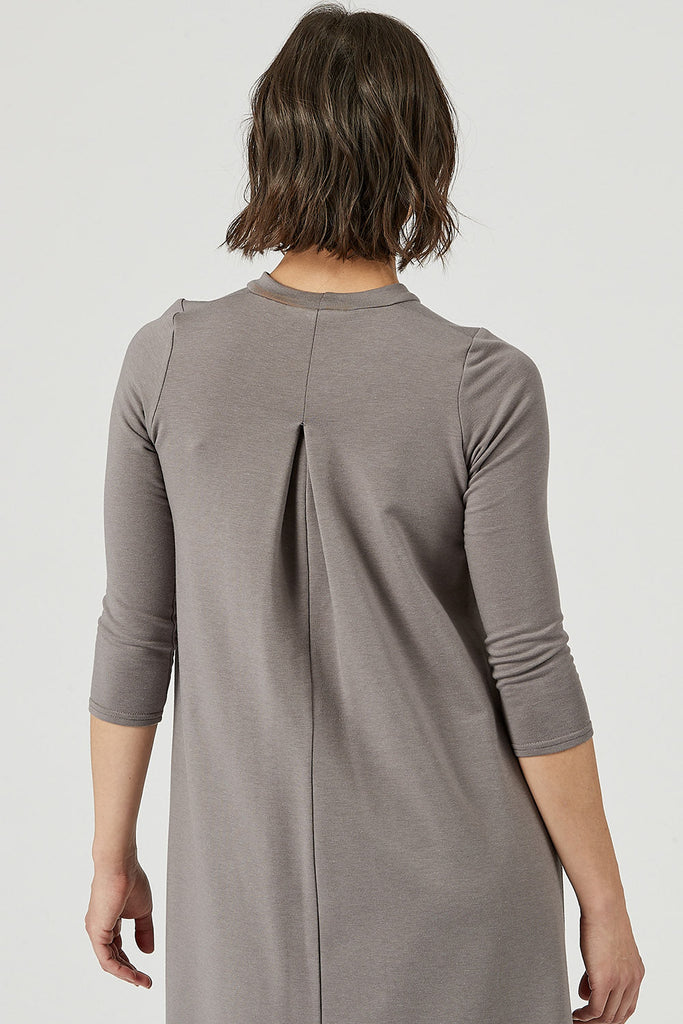 Woman wearing Tencel mock neck 3/4 sleeve dress in grey, Canadian made women's loungewear, back close