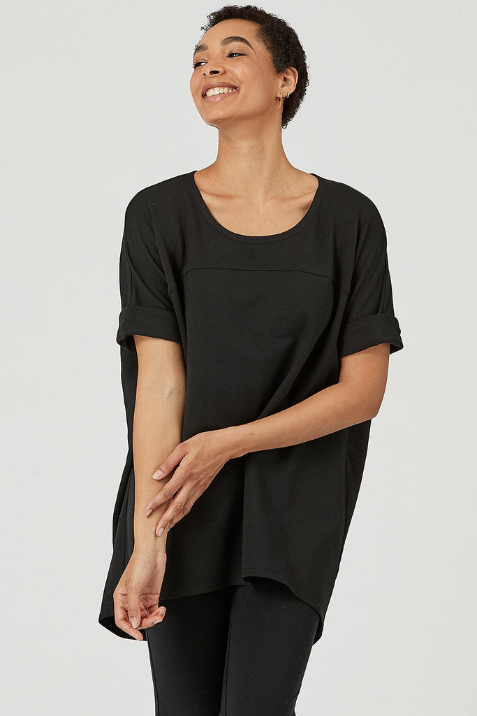 Woman wearing Tencel slouchy top in black, Canadian made women's loungewear, front