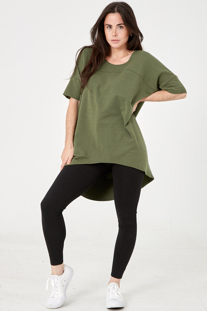 Woman wearing Tencel slouchy top in green, Canadian made women's loungewear, front