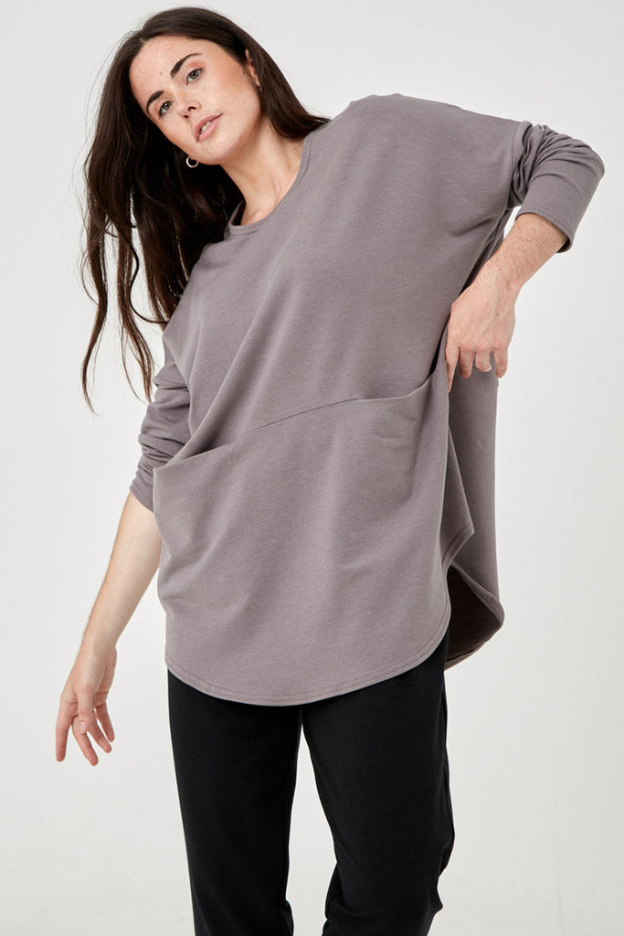 Woman wearing Tencel oversized top with pockets in grey, Canadian made women's loungewear, front