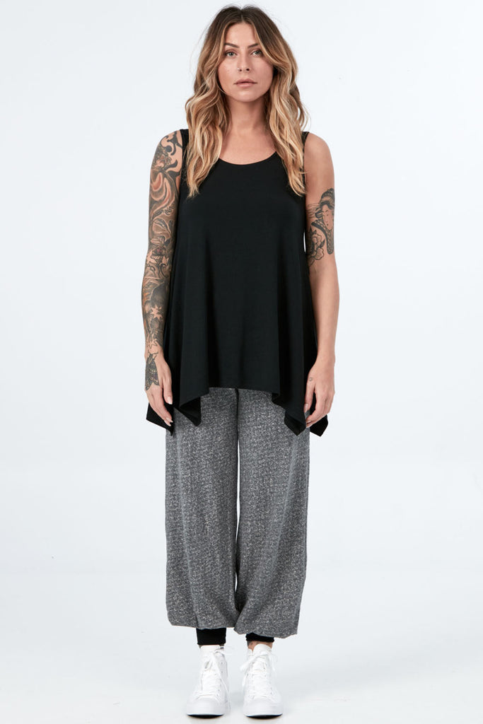 Woman wearing Tencel 3/4 sleeve top in black, Canadian made women's loungewear, standing