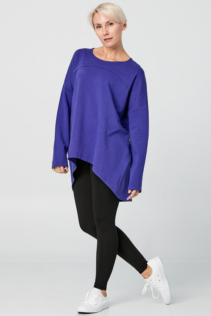 Woman wearing Tencel long sleeve slouchy top in blue, Canadian made women's loungewear, front