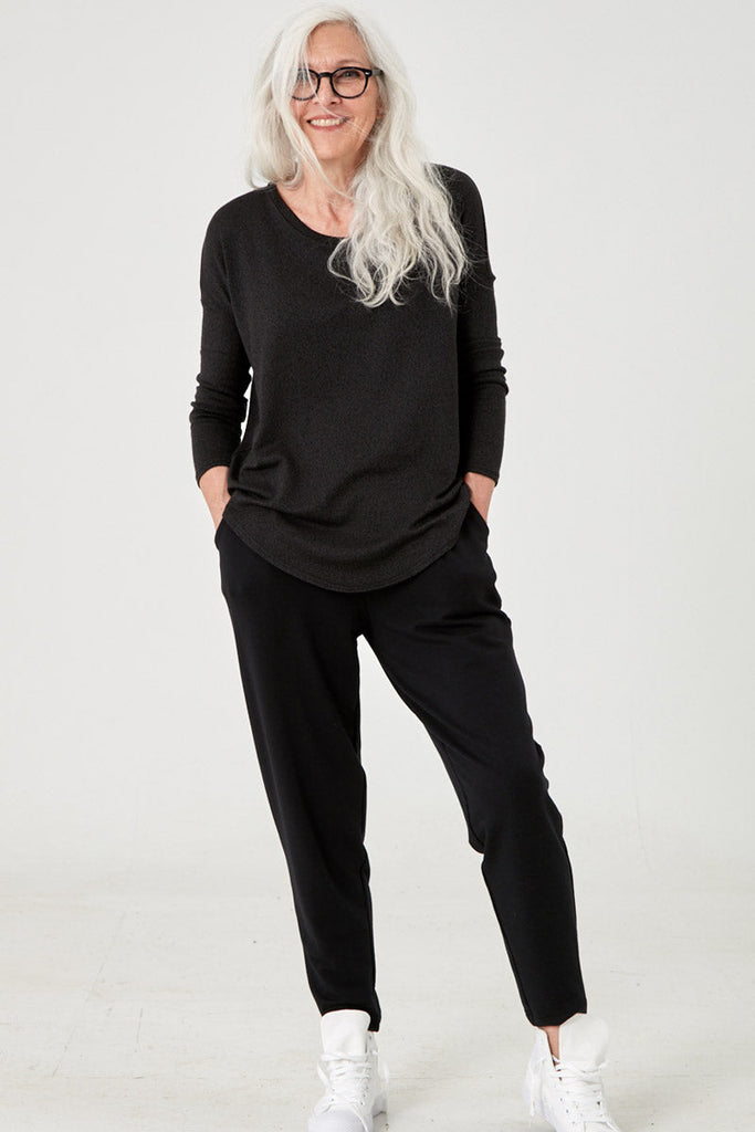 Woman wearing Tencel split back top in black, Canadian made women's loungewear, front