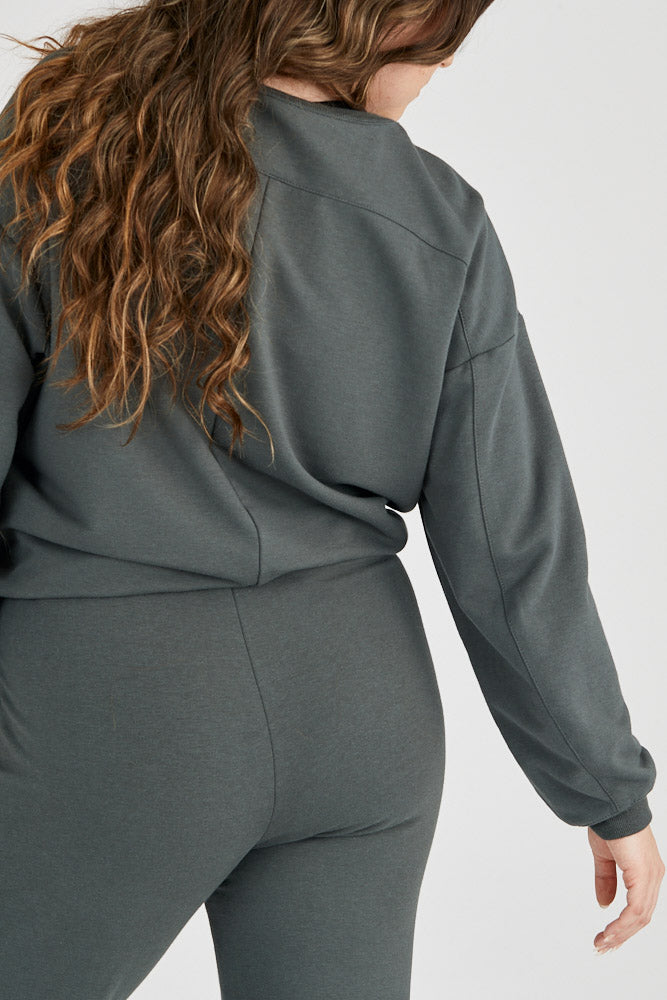 Woman wearing bamboo fleece sweatpants in dark grey, Canadian made women's loungewear, back close