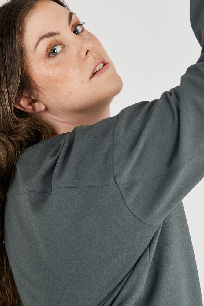 Woman wearing bamboo sweatshirt in grey, Canadian made women's loungewear, close