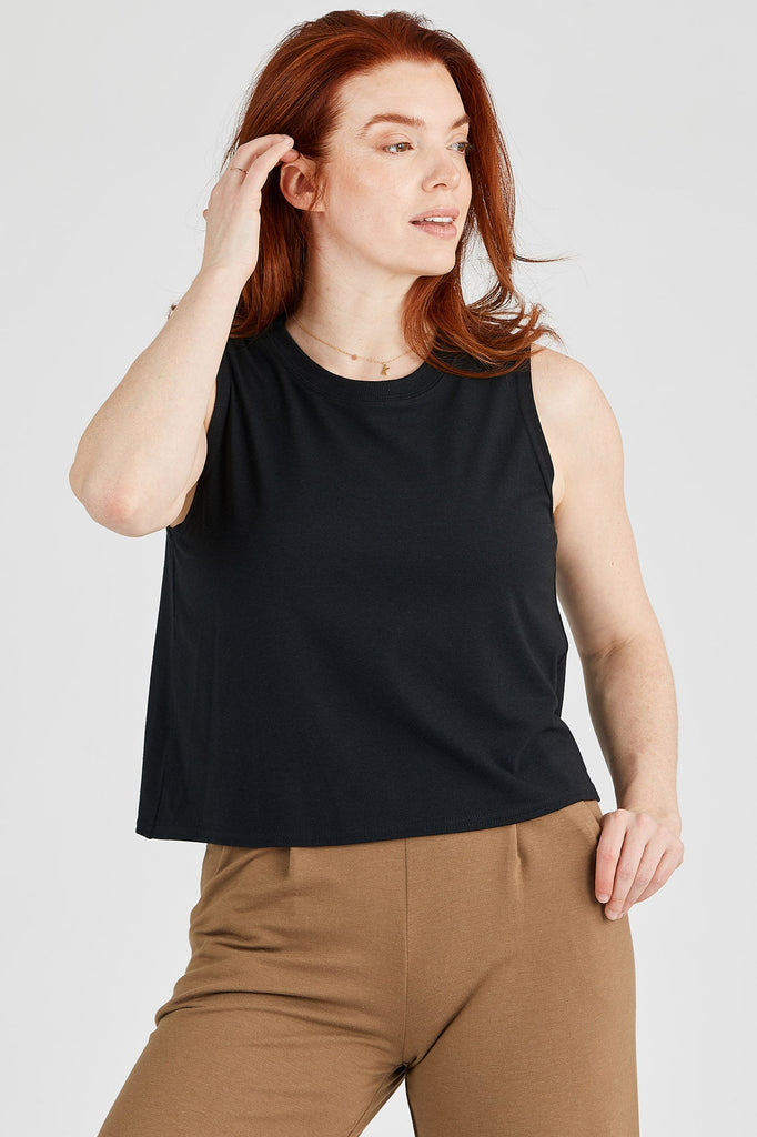 Woman wearing Tencel crop top in black, Canadian made women's loungewear, front