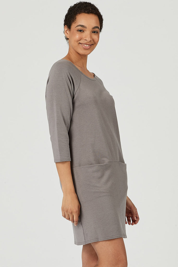 Woman wearing tencel tunic with pockets in grey, Canadian made women's loungewear, side
