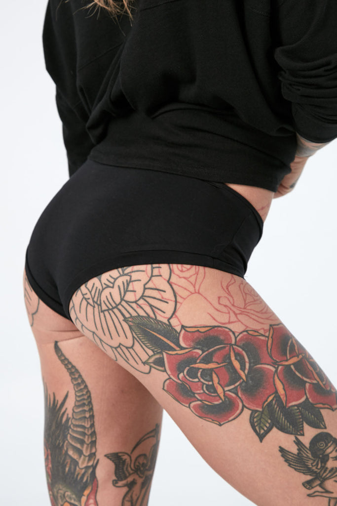 Woman wearing Tencel underwear in black, Canadian made women's loungewear, close back